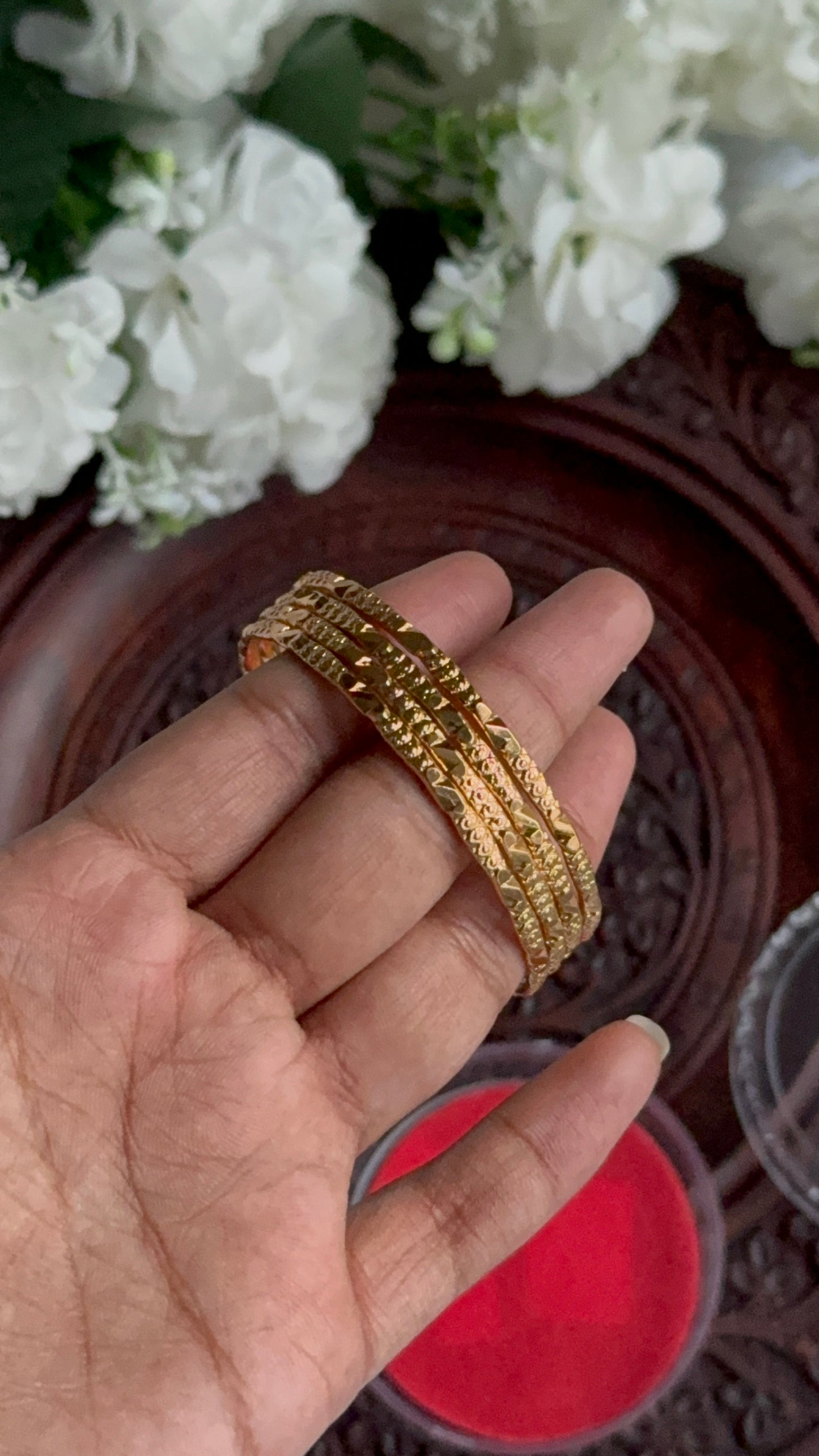 Gold plated slim bangles (4)