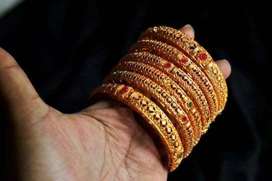 Gold designer bangles