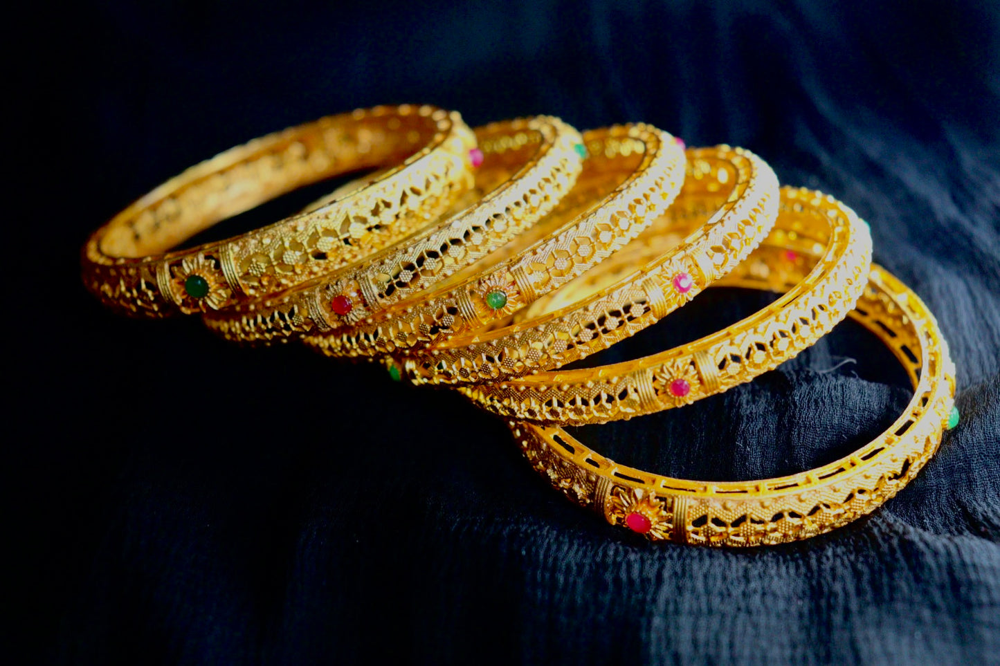 Gold designer bangles